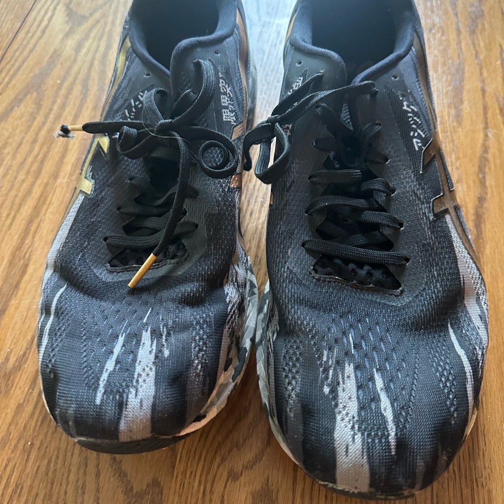 Asics Black and Gray Athletic Shoes with Flexible Design